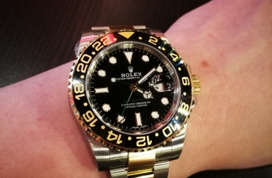 物有所值-劳力士格林尼治 GMT II 间金黑腕表作业